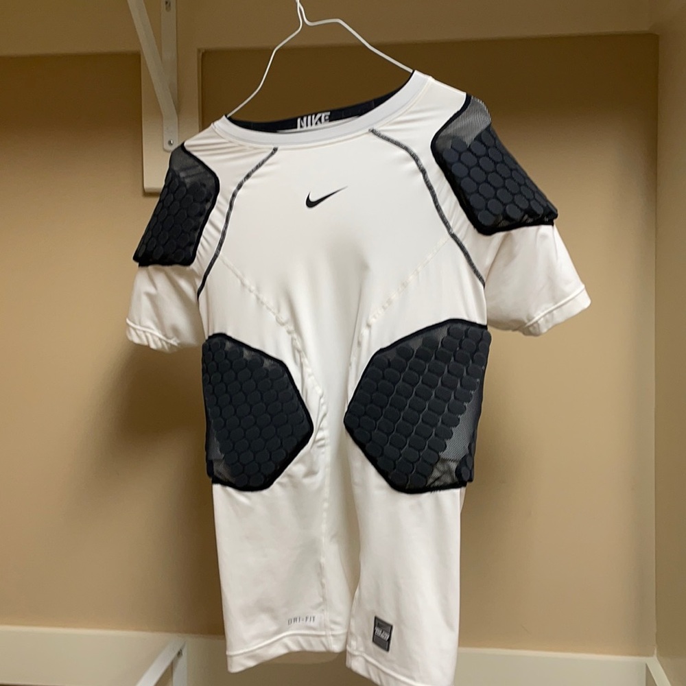 Nike padded compression football undershirt.